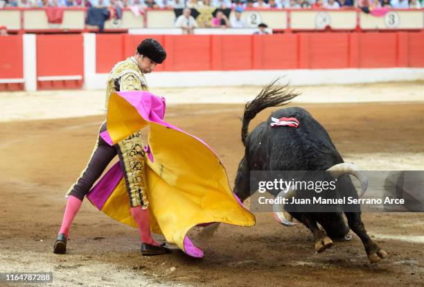 Spanish bullfighter Cayetano Rivera performs during a bullfight as part of the Feria Santiago at Coso de Cuatro Caminos on July 26, 2019 in...