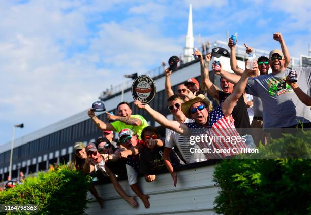 Fans cheer during the Monster Energy NASCAR Cup Series Gander RV 400 at Pocono Raceway on July 28, 2019 in Long Pond, Pennsylvania.