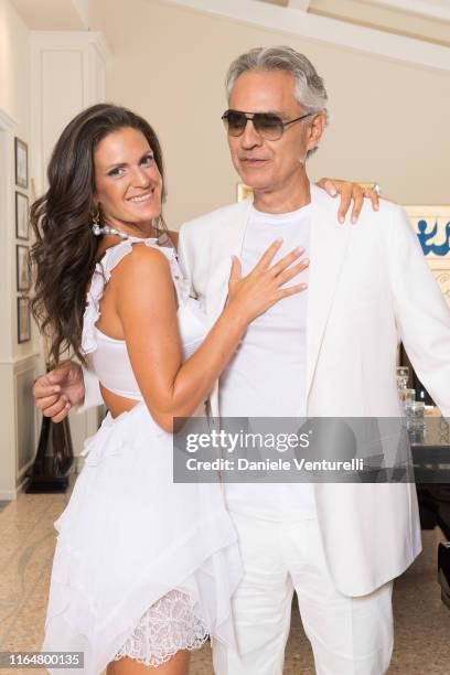 Singer Andrea Bocelli and Veronica Berti Pose at the Andrea Bocelli Celebrity Fight Night 2019 on July 28, 2019 in Forte dei Marmi, Italy.