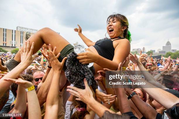 Fans crowd surfing on day 2 of the MoPop Festival 2019 at West Riverfront Park on July 28, 2019 in Detroit, Michigan.