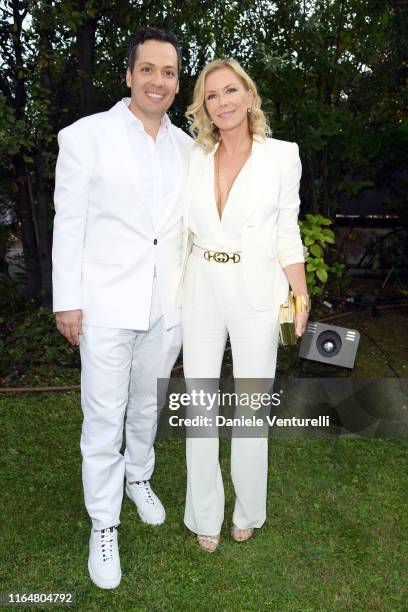 Dominique Zoida and Katherine Kelly Lang pose at the Andrea Bocelli Celebrity Fight Night 2019 on July 28, 2019 in Forte dei Marmi, Italy.