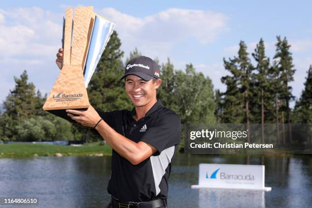 Collin Morikawa of the United States poses with the trophy after winning during the final round of the Barracuda Championship at Montreux Country...