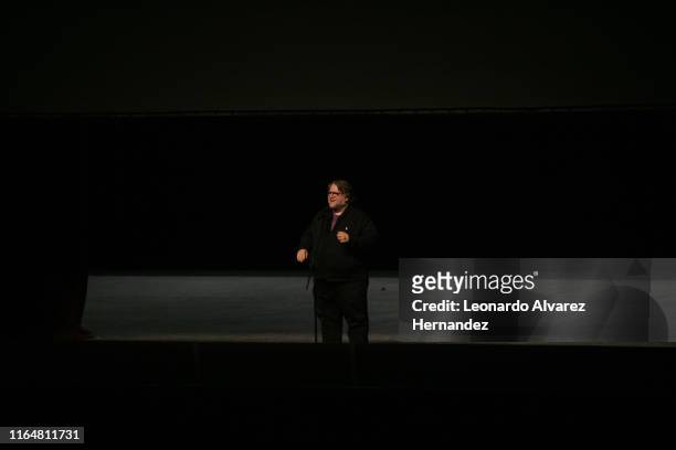 Film director Guillermo del Toro speaks during the opening concert "En Casa con mis Monstruos Sinfónico" by the Jalisco Philharmonic Orchestra at...