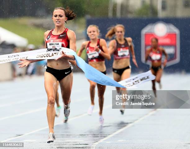 Shelby Houlihan crosses the finish line to win the Women's 5000 Meter Final during the 2019 USATF Outdoor Championships at Drake Stadium on July 27,...