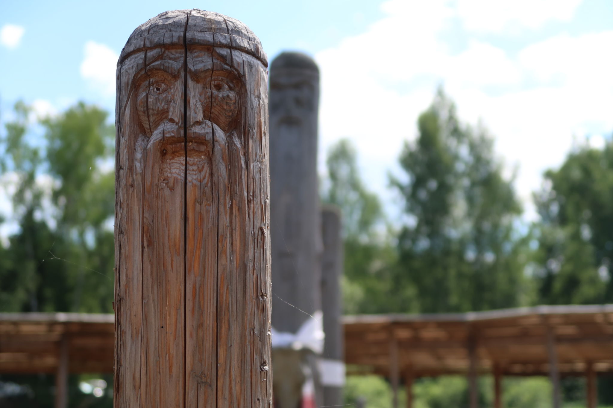 Ancient wooden slavic pagan idol of god. Heathen temple in the forest Ancient wooden slavic pagan idol of god. Heathen temple in the forest