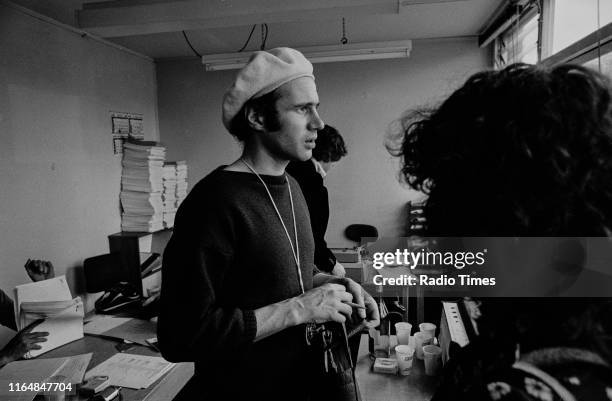 Writer Neil Innes in a script conference for BBC television show 'Monty Python's Flying Circus', 1974.