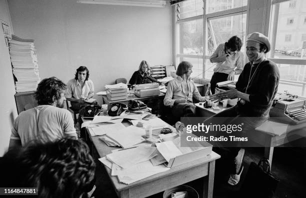 Writers Ian MacNaughton, Terry Jones, unknown, Graham Chapman, Michael Palin and Neil Innes in a script conference for BBC television show 'Monty...