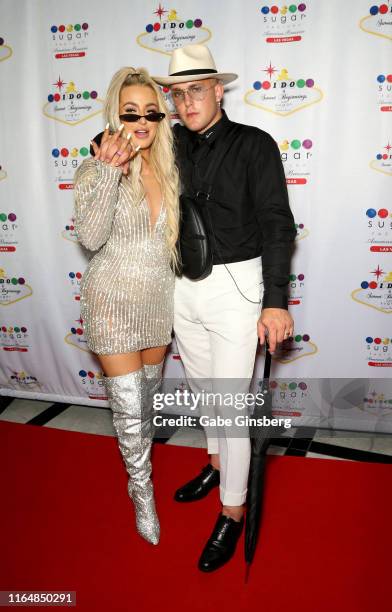 Tana Mongeau and Jake Paul attend their wedding reception at the Sugar Factory American Brasserie at the Fashion Show mall on July 28, 2019 in Las...