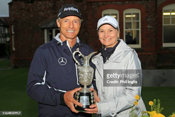 Bernhard Langer of Germany and his wife Vicki pose with the trophy after the final round of the Senior Open presented by Rolex played at Royal Lytham...