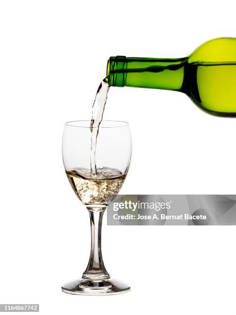 white wine glass and bottle on a white background. - white wine glass bildbanksfoton och bilder