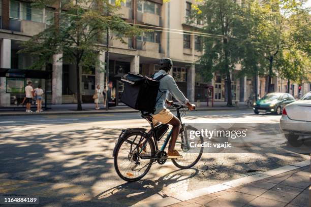 African Delivery Rider African Delivery Rider Photos and Premium High Res Pictures - Getty Images