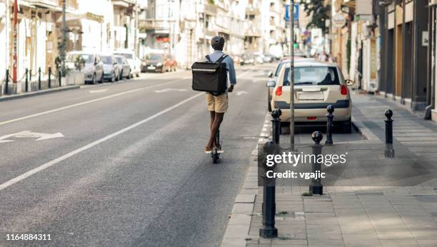 African Delivery Rider 610 African Delivery Rider Stock Photos, High-Res Pictures, and Images ...