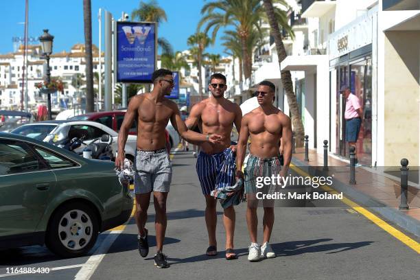 Boohoo & BoohooMAN take Theo Campbell, Adam Collard and Rykard Jenkins for a Yacht Trip on July 29, 2019 in Marbella, Spain.