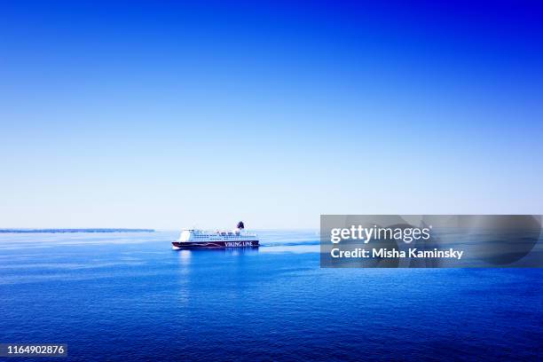 cruise ship leaving the tallinn passenger port - tallinn stock pictures, royalty-free photos & images