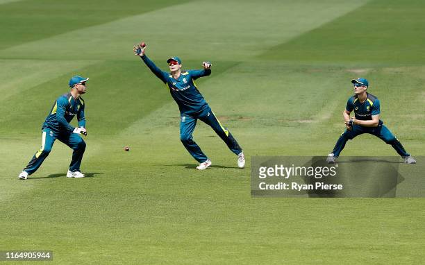 David Warner, Steve Smith and Cameron Bancroft of Australia practice slips catching during the Australia Nets Session at Edgbaston on July 29, 2019...