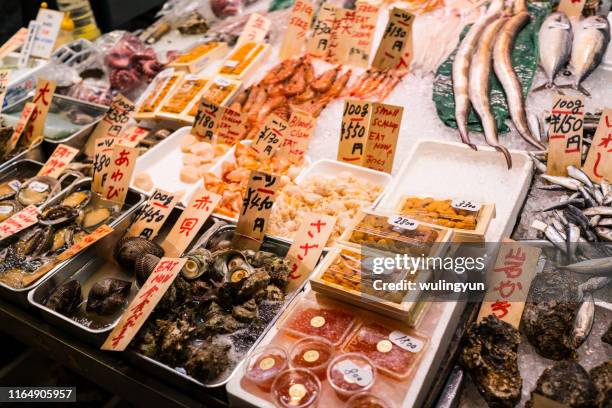 seafood stall at nishiki market - nishiki market stock pictures, royalty-free photos & images