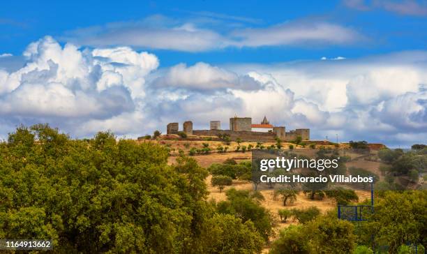 Mourão castle seen from Herdade dos Delgados Dark Sky View & Spa Hotel on July 26, 2019 in Mourão, Portugal. Situated in the middle of the Dark Sky...