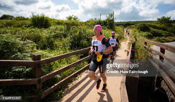 Alexis Charrier and Nicolas Remires lead the Wales SwimRun race through Pembrokeshire,starting in Freshwater East, finishing at Amroth on July 27,...