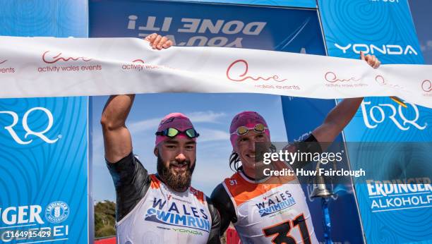 Alexis Charrier and Nicolas Remires Celebrate winning the Wales SwimRun race through Pembrokeshire, starting in Freshwater East, finishing at Amroth...