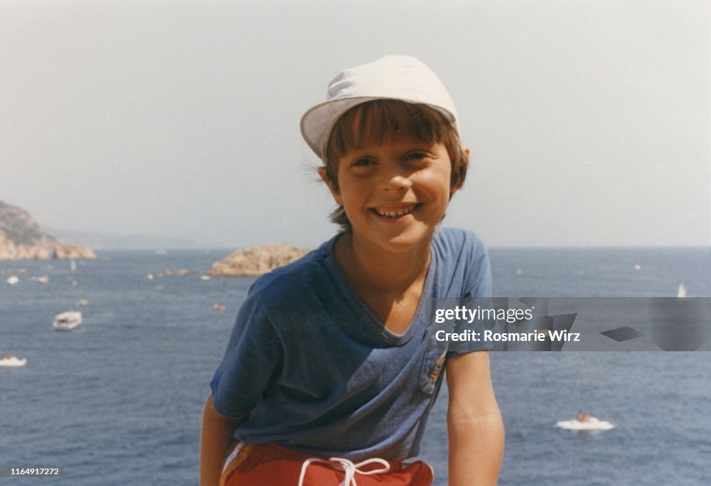 Italian boy of five in front of sea