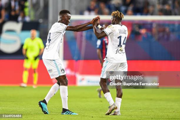 Le Havre's forward Jamal Thiare celebrates his goal with Le Havre's midfielder Pape Gueye during the French Ligue 2 football match between Stade...
