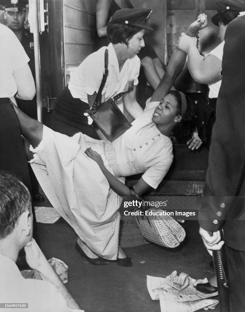 African American Woman Being Carried to Police Patrol Wagon During Demonstration, Brooklyn, New York, USA, Dick DeMarsico, World Telegram & Sun, 1963