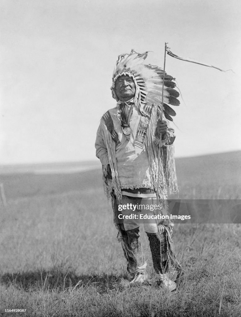 Sitting Bear, Arikara Chief, Full-Length Portrait in full Regalia, Edward S Curtis, 1908