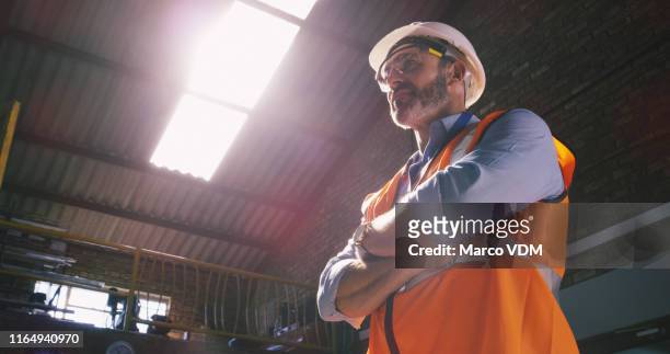 the all seeing eyes of an engineer - low angle view person stock pictures, royalty-free photos & images