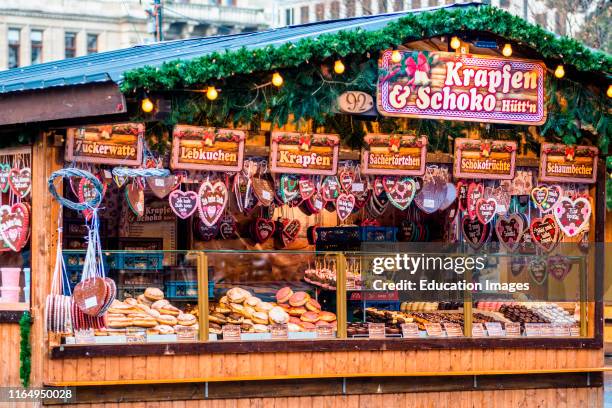 Heart-Shaped Gingerbread Cookies or Lebkuchen stall at Christmas market at Viennas Rathaus, Austria.