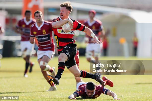 Mitchell Drummond of Canterbury skips out of a tackle to score a try during the round 4 Mitre 10 Cup match between Canterbury and Southland at...