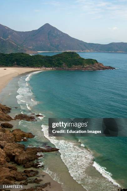 Tai Long Wan, Big Wave Bay, with Ham Tin Wan beach along the South China Sea and Sharp Peak behind, Sai Kung Country Park, New Territories, Hong Kong...