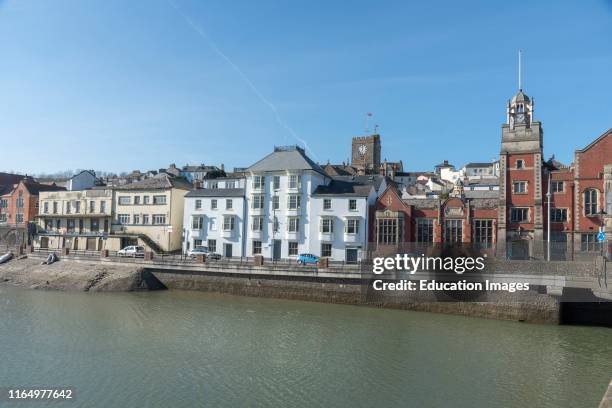 Bideford, North Devon, England UK, Bideford town hall, library and St Marys Church viewed from East the Water.