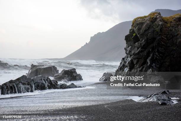dvotta beach of alftafjordur at austurhorn, east-south of iceland - butte rocky outcrop stock pictures, royalty-free photos & images