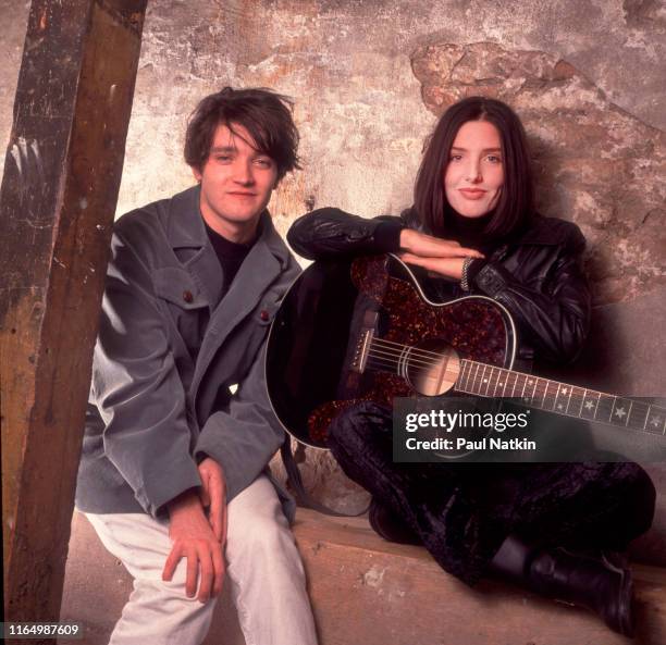 Portrait of Scottish musicians Johnny McElhone and Sharleen Spiteri, both of the group Texas, as they pose backstage at Schubas nightclub, Chicago,...