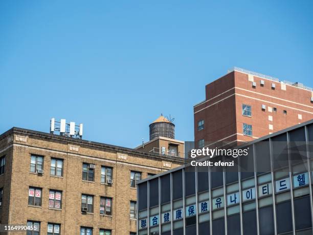 buildings in flushing, queens, new york city - flushing queens stock pictures, royalty-free photos & images