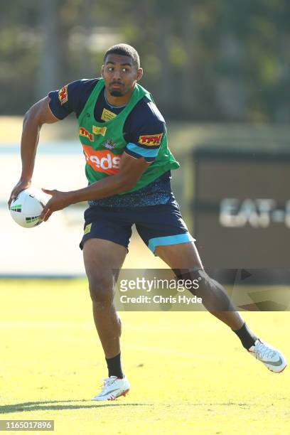 Kallum Watkins passes during a Gold Coast Titans NRL training session at Titans High Performance Centre on July 30, 2019 in Gold Coast, Australia.