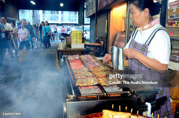 Staff grills eels on July 27, 2019 in Urayasu, Chiba, Japan. It is said that people eat eel on the Doyo-no-Ushi-no-Hi, July 27 this year, day of the...