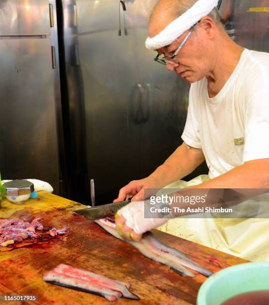 Workers prepare for cooking eels on July 27, 2019 in Urayasu, Chiba, Japan. It is said that people eat eel on the Doyo-no-Ushi-no-Hi, July 27 this...