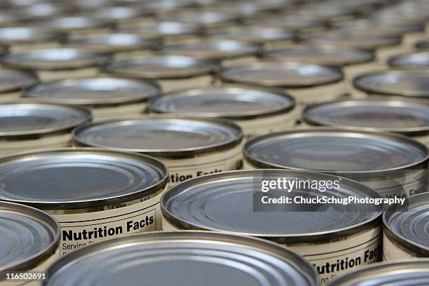 a group of food cans with the nutrition fact label showing - canned food stock pictures, royalty-free photos & images