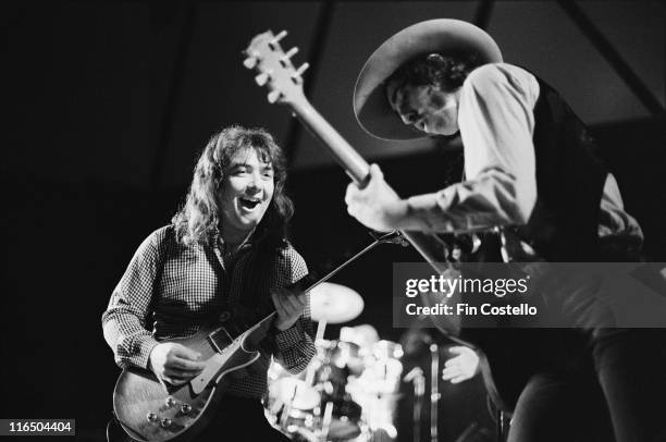 Bernie Marsden, British rock guitarist alongside British rock guitarist Micky Moody on stage during a live concert performance by the band...