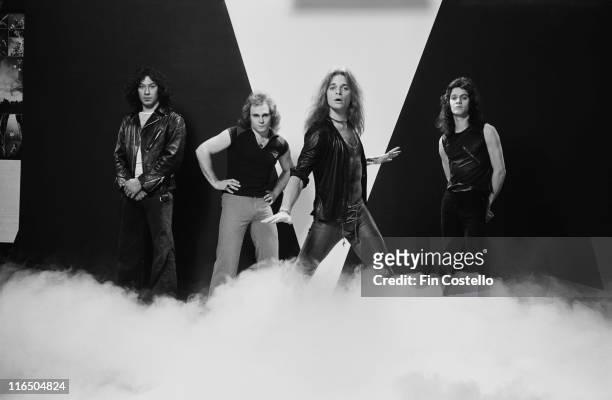 Drummer Alex Van Halen, bassist Michael Anthony, singer David Lee Roth and guitarist Eddie Van Halen), US hard rock band, pose for a group studio...