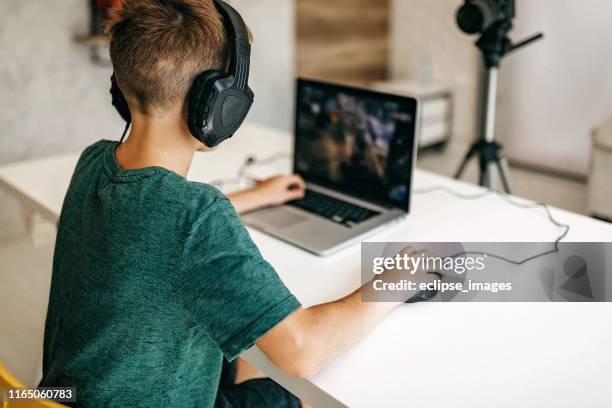 kid recording his gameplay for vlog - computer gaming stock pictures, royalty-free photos & images