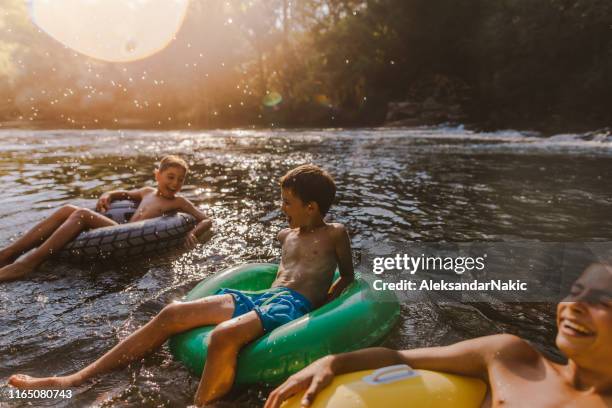 a perfect summer day - kids at river stock pictures, royalty-free photos & images