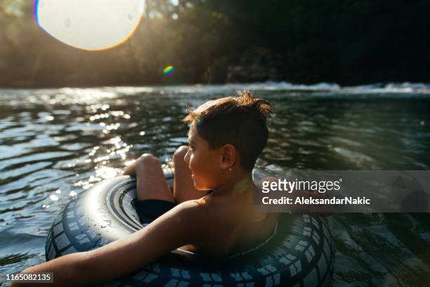 making childhood memories - river tubing stock pictures, royalty-free photos & images