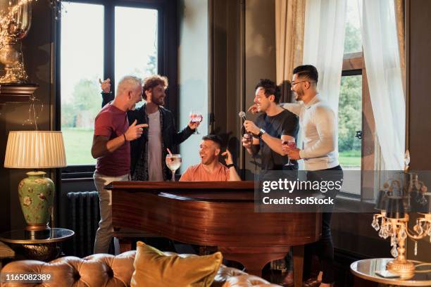 karaoke performance - pianist stock pictures, royalty-free photos & images