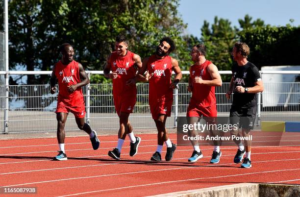 Naby Keita, Roberto Firmino, Mohamed Salah and Xherdan Shaqiri of Liverpool during a training session on July 30, 2019 in Evian-les-Bains, France.