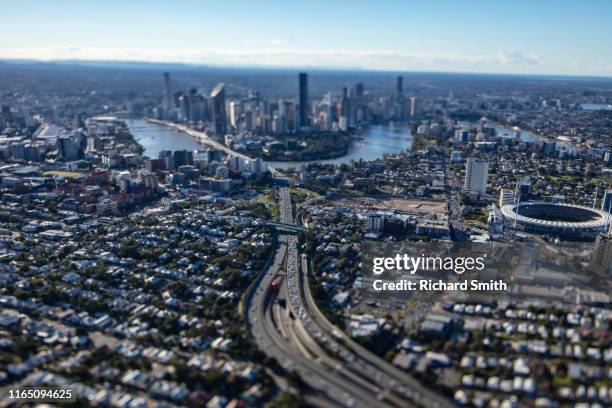 a view of brisbane city from a helicopter - brisbane street stock pictures, royalty-free photos & images