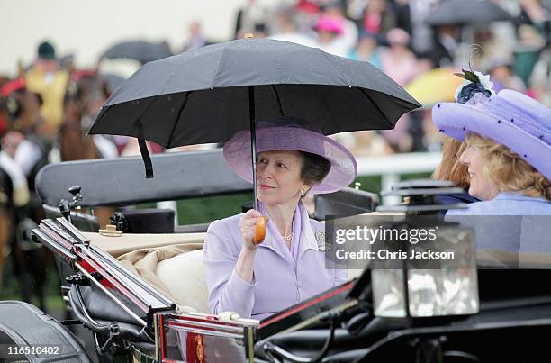 Princess Anne, Princess Royal arrives as part of the royal carriage procession on Ladies Day at Royal Ascot at Ascot Racecourse on June 14, 2011 in...