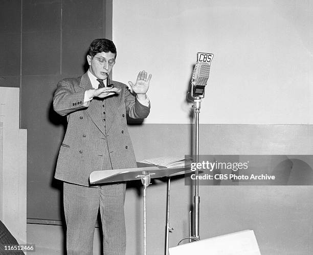 Rehearsal of The Free Company radio drama with conductor Bernard Herrmann. Image dated April 6, 1941.