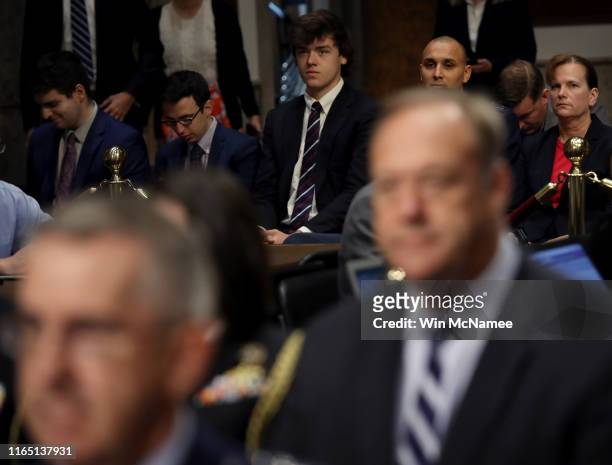 Air Force Col. Kathryn Spletstoser , listens as U.S. Air Force Gen. John E. Hyten testifies before the Senate Armed Services Committee on his...